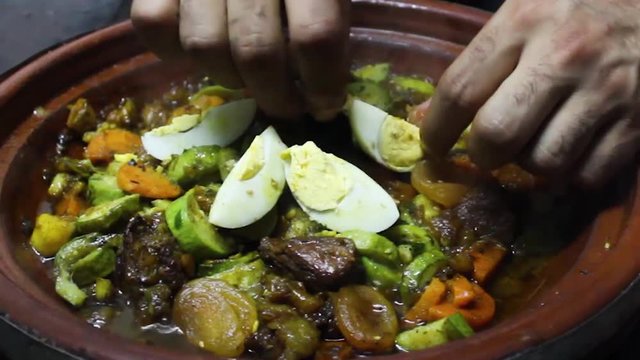 Tajine Being Cooked by a Chef in Essaouira