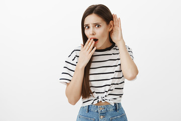 Girl learned from friend terrible gossip. Portrait of shocked disappointed attractive woman in...
