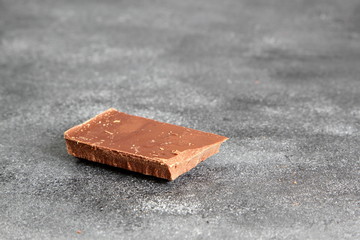 Black chocolate on dark background, close-up