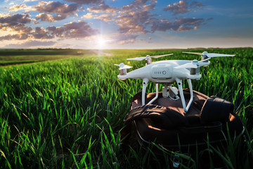 drone quad copter on green corn field