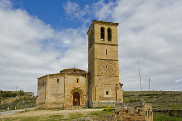 Vera Cruz church in Segovia Spain with a Christian cross in front