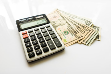 Close-up  Money and Calculator, American Dollar Banknotes