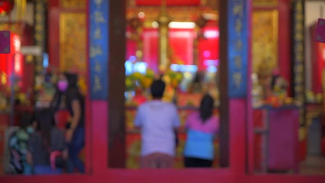 4K Movie Blur Effect of People Walking in Chinese Temple, Songkhla, Thailand