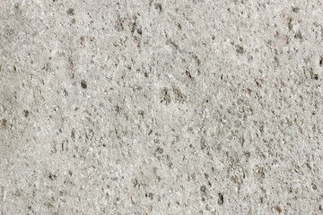 concrete wall with stones