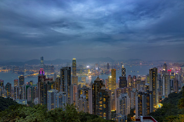 HONG KONG - NOV 6: Neon lights of Hong Kong on November, 6, 2017. Evening skyline from The Peak