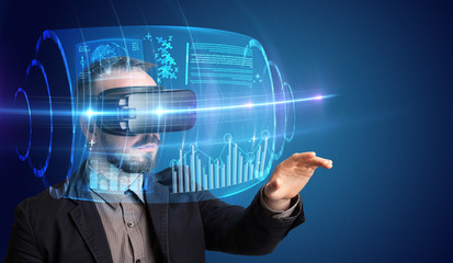 Obraz premium Amazed businessman with high tech 3D projection in front of him 