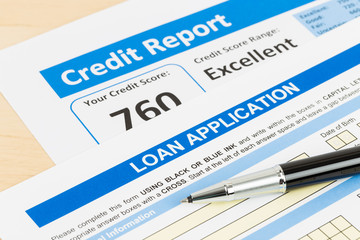 Loan application form excellent credit score with pen