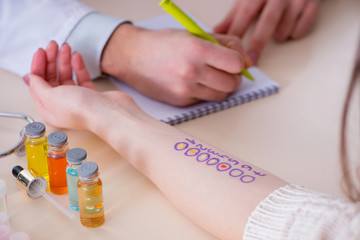Doctor testing allergy reaction of patient in hospital