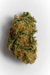 Close up of prescription and recreational indica medical marijuana isolated on monochrome background