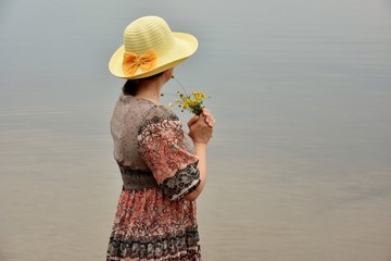 a woman by the lake