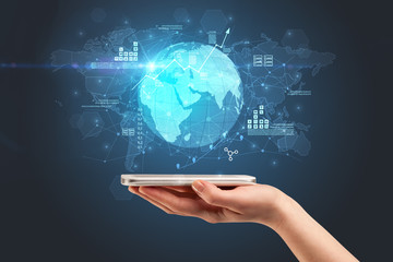 Hand using phone with multinational worldwide estate report concept
