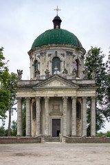 Fototapeta na wymiar Photo of Ancient Baroque Roman Catholic church of St. Joseph in Pidhirtsi, Ukraine - July 2018