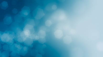 Blue hexagon bokeh on black background blurred light, Abstract blurred gradient background in...