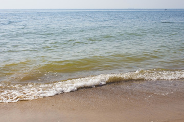 Soft wave of the sea on the sandy beach