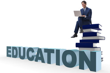 Businessman in telelearning concept with laptop