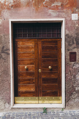 Wooden old door in Rome, Italy