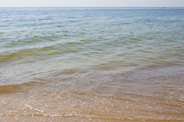 Soft wave of the sea on the sandy beach