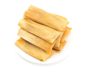 Homemade Wrapped Tamales Isolated on a White Background