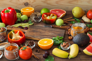 Healthy food, clean food selection:  fruits, vegetables, seeds, spices on wooden background