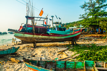 Fototapeta na wymiar Traditional boats in Fishing village at port, Phu Quoc island in Vietnam