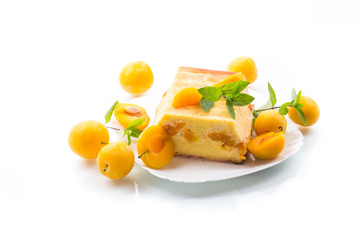 sweet curd casserole stuffed with yellow plums inside