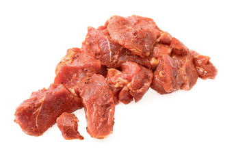 Raw fresh meat chunks isolated on white, ready for barbecue.