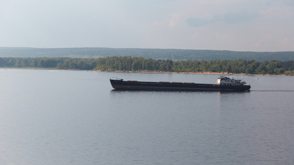 barge floating on the river