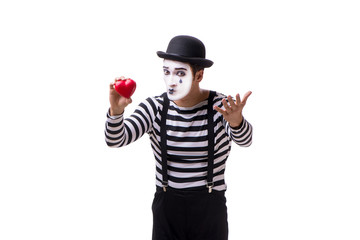Mime holding red heart isolated on white background 