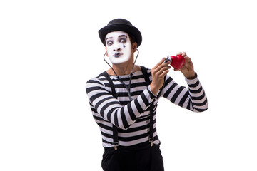 Mime with stethoscope isolated on white background 
