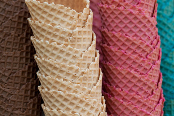 Stack of multi-colored wafer cups for ice cream