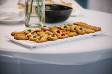 exposure of sweet cookies on white tray