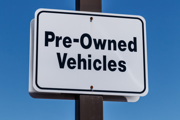 Pre Owned Vehicles sign at a Used Car Dealership I