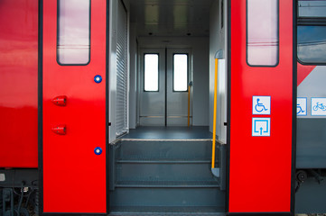 Red train in modern railway