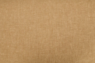 Texture of natural linen flax fabric closeup as textile background