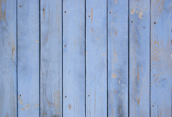 Fototapeta premium blue old wooden fence. wood palisade background. planks texture