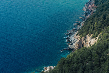 Fototapeta na wymiar View of the beach Cleopatra. Alanya, Turkey.Wonderful country.Mediterranean sea.Steep rock.Rugged cliff.Mountains and the sea.Vacation at sea.