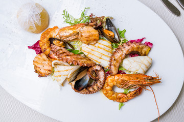 Seafood grilled on plate