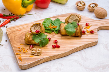 Eggplant rolls stuffed with nuts