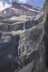 Fototapeta na wymiar Spectacular Waterfall Draining Emerald Glacier in Yoho National Park Canadian Rocky Mountains