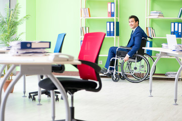 Disabled businessman working in the office