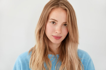 Friendly gorgeous young girlfriend with serious look listent attentively friend`s story, gives...