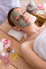 Obraz na płótnie Canvas Young woman in spa health concept with face mask