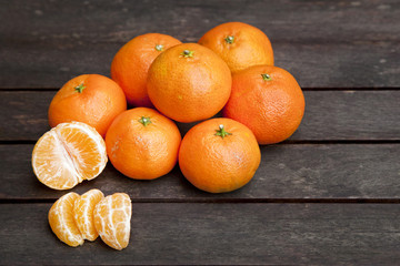 Mandarine oranges on a wooden table