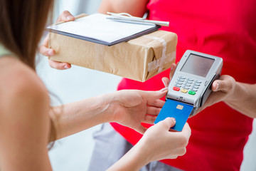 Parcel delivery being paid with pos and credit card