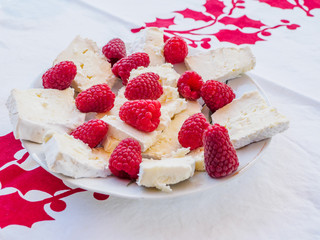 Cheese and raspberries