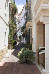Fototapeta na wymiar Street in Marbella old town (Malaga, Andalusia, Spain.)