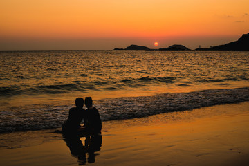 sunset on the beach with lover