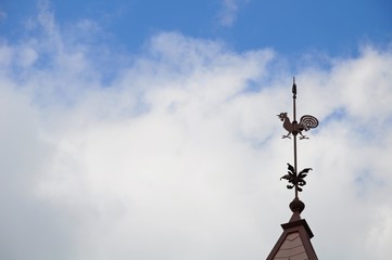 A Weather Cock on roof of a building in Kobe, Japan