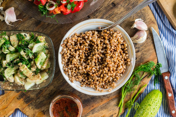 Tradtitional Russian buckwheat porridge on lunch or dinner. Vegan vegetarian food. Paleo healthy and trendy diet