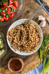 Tradtitional Russian buckwheat porridge on lunch or dinner. Vegan vegetarian food. Paleo healthy and trendy diet